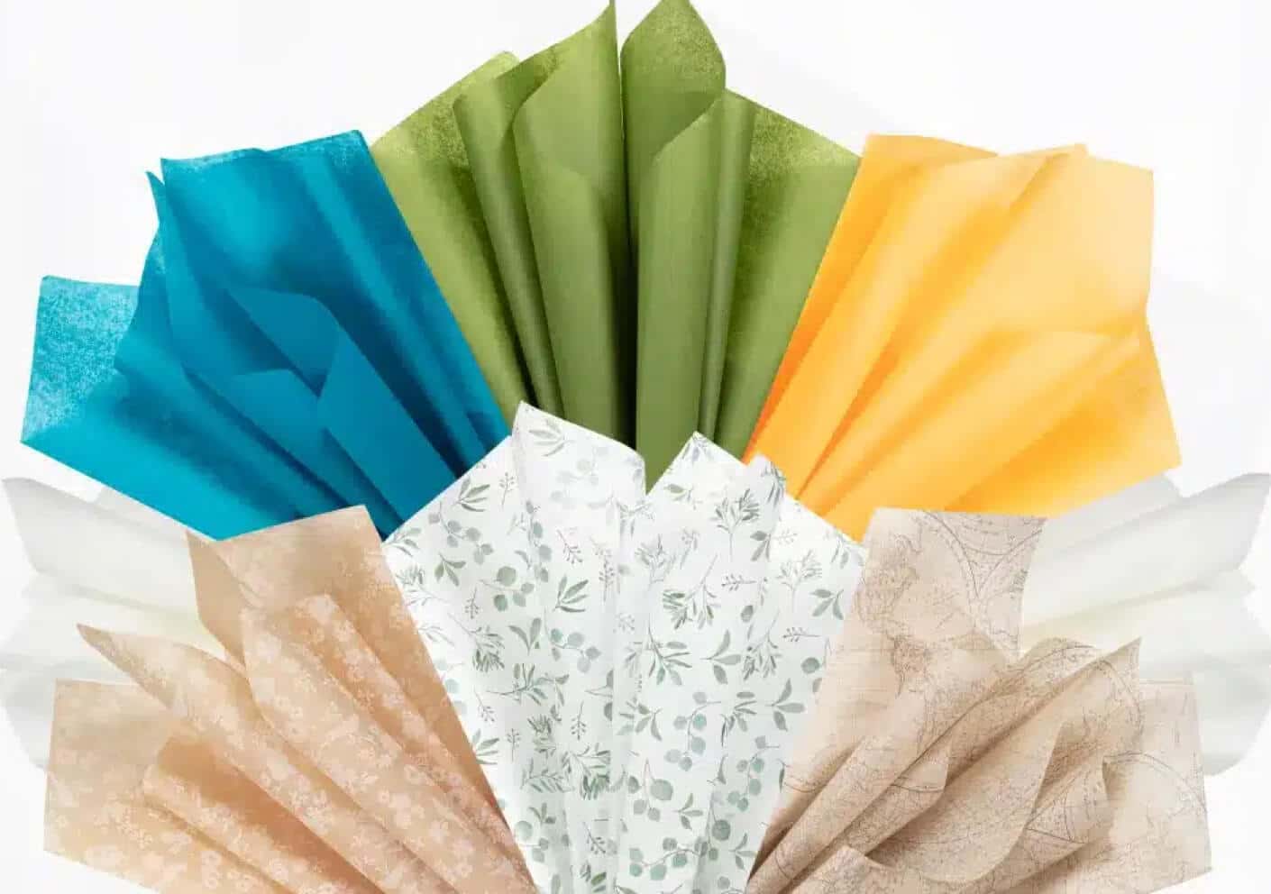 Eco-friendly tissue paper folded and fluffed to show their different colors and prints.